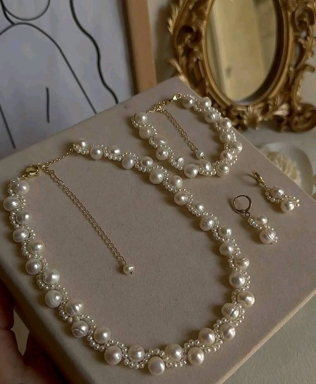 Handmade freshwater pearl necklace, bracelet and earring set
